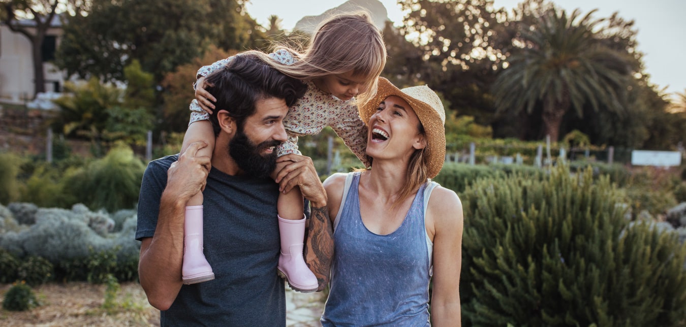 Happy and healthy family with daughter